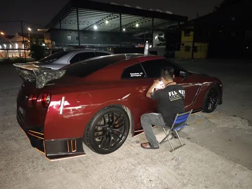 Locksmith working on a car